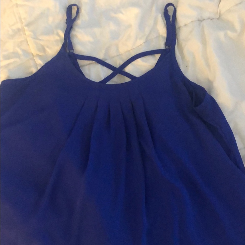 Strappy, crisscrossed back tank.